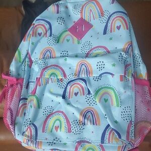 Rainbow Patterned Kids Backpack with Pink Accents In New Condition.